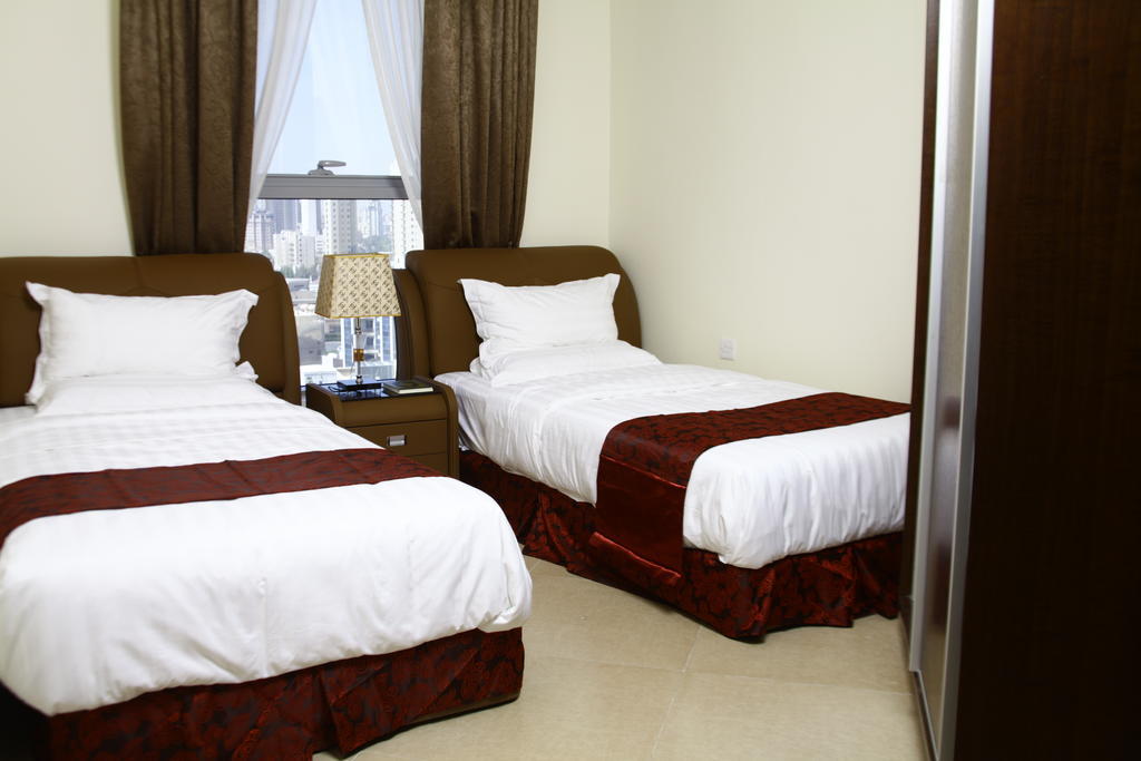 Laguna Hotel Suites Kuwait City Zimmer foto